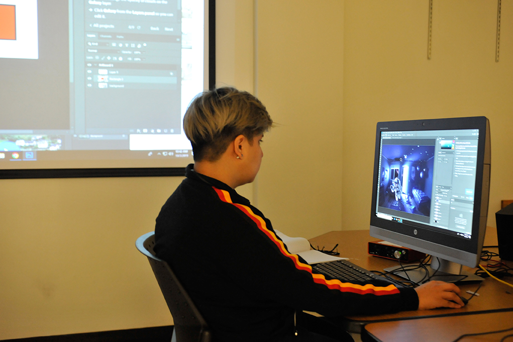 A student using a computer in class.