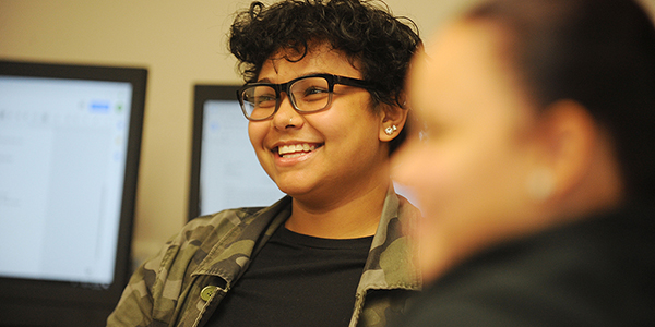 A student smiling.